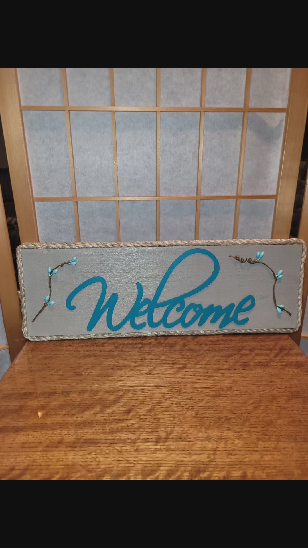 welcome sign w/blue flowers